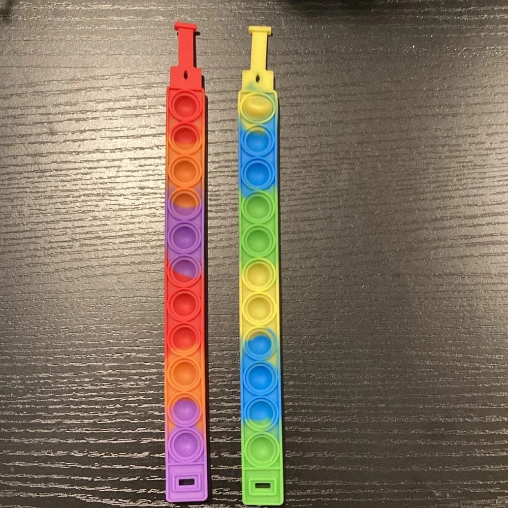 Pop-Its Set of 4 includes Glow In Dark Dinosaur New Kids Sensory Autism Fidget